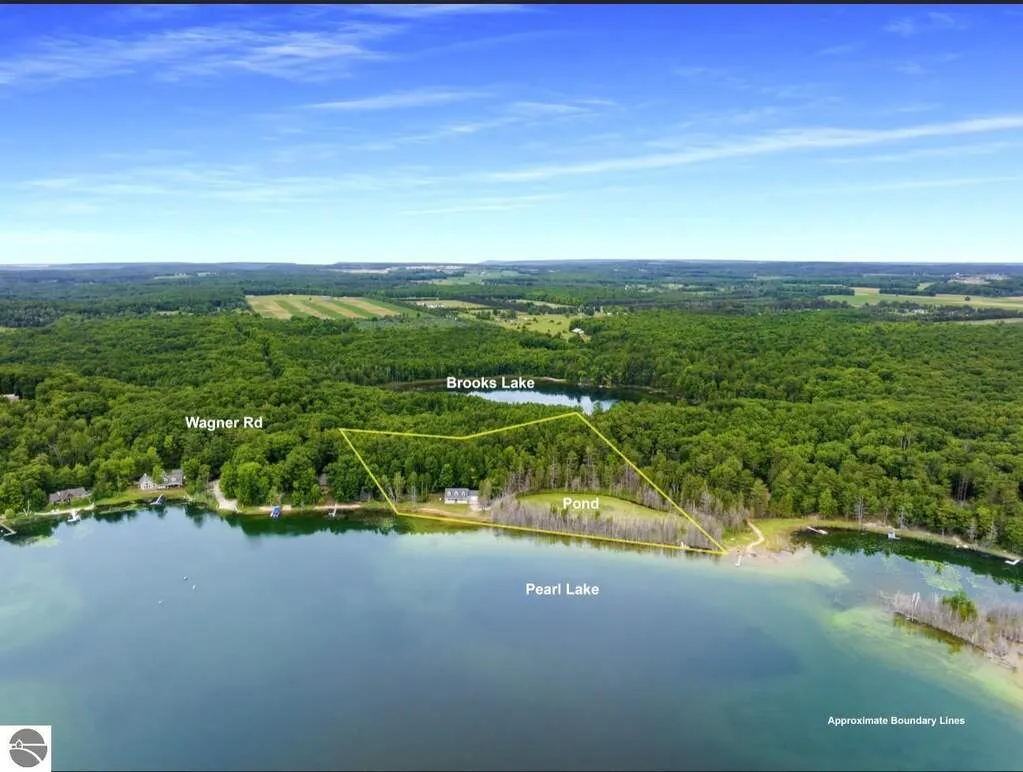 Aerial of the home and its acreage above Pearl Lake