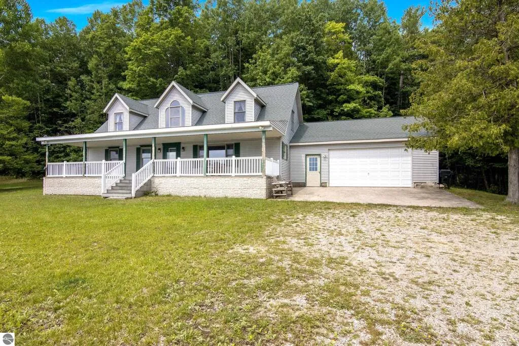 The home and detached two-car garage