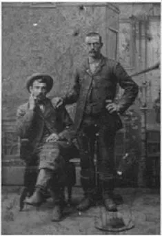 Isaac Clawson, seated, in a portrait from around 1875